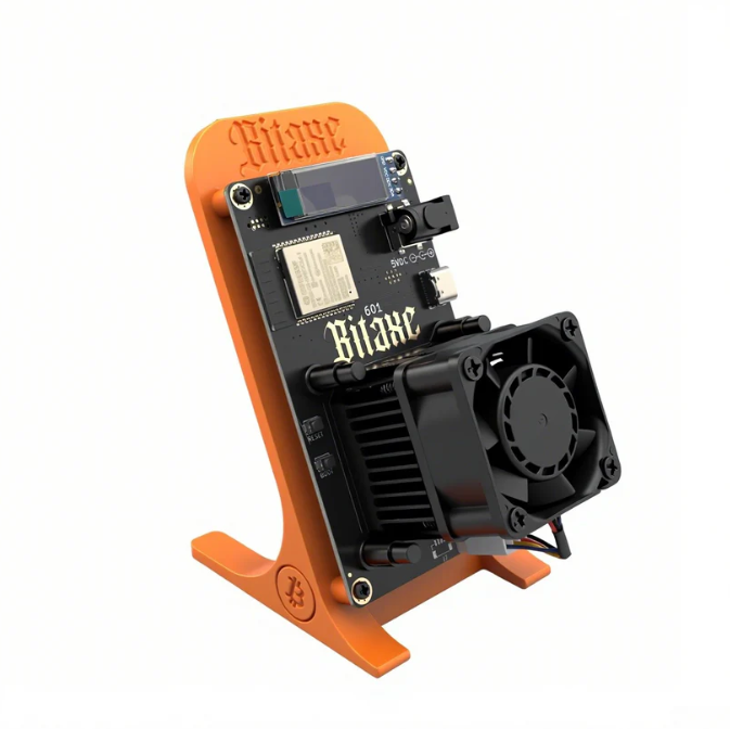 Bitaxe Gamma 601 Solo Bitcoin Miner in black, showcasing its compact design and cooling vents for efficient mining.